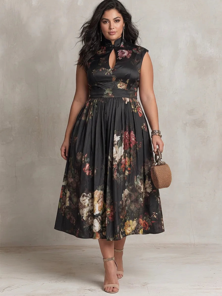 Front view of a model wearing a black floral satin pleated midi dress with keyhole mock neck and a woven handbag