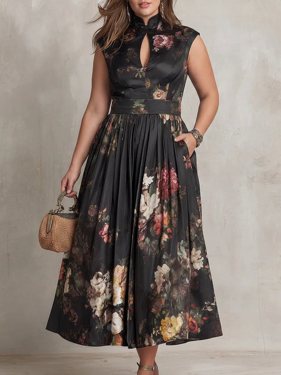 Close crop of the dress bodice and flowing pleated skirt, highlighting the sleeveless cut and A-line silhouette