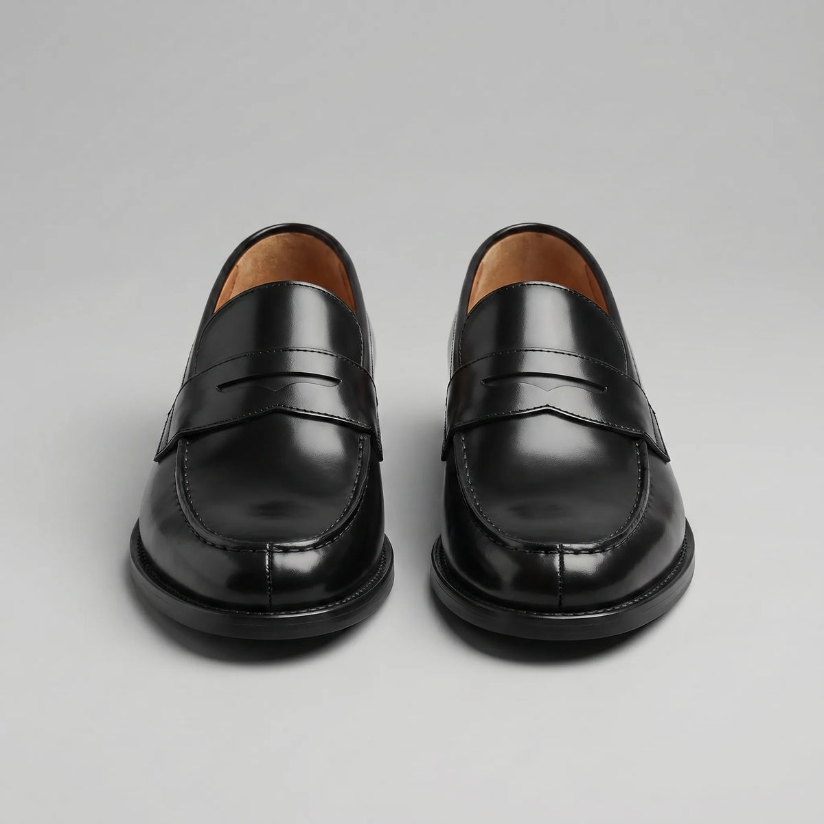 Front-facing view of the pair showing the symmetrical saddle straps and round-square toe shape
