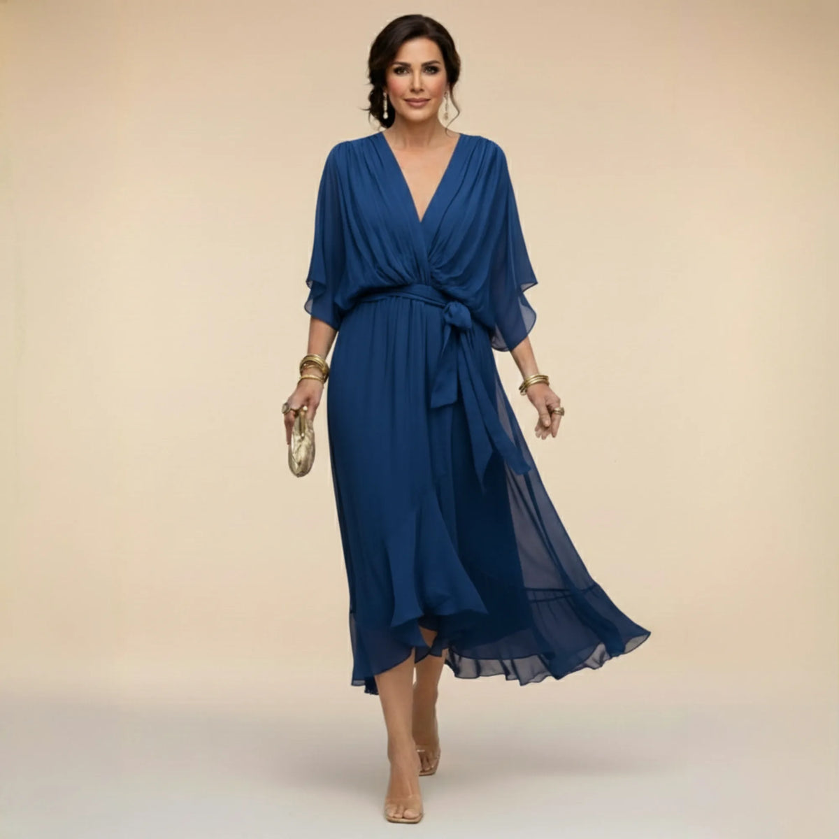 Blue chiffon V-neck midi dress with ruched bodice, wide sleeves and self-tie belt, worn walking