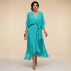 Turquoise chiffon midi dress with wrap bodice, three-quarter sleeves and defined waist tie
