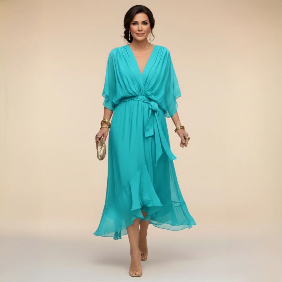 Turquoise chiffon midi dress with wrap bodice, three-quarter sleeves and defined waist tie