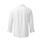Back view showing the relaxed shoulder yoke, box pleat and long sleeves of the crinkled shirt