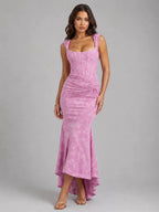 Front view of a pink floral jacquard corset maxi dress with sweetheart neckline and high-low fishtail hem