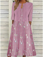 Dusty pink floral midi dress with matching cropped jacket, close front view showing notch neckline