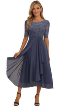 Grey-blue lace midi dress with elbow sleeves, fitted waist and a flared chiffon skirt gathered to one side