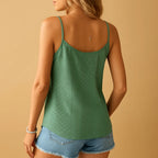 Back view of green knit cami top showing scoop back, thin adjustable straps and soft ribbed knit texture
