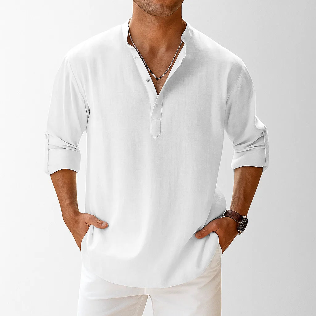 Cropped front view of a man wearing the shirt in white, showing the open collar and popover button placket.