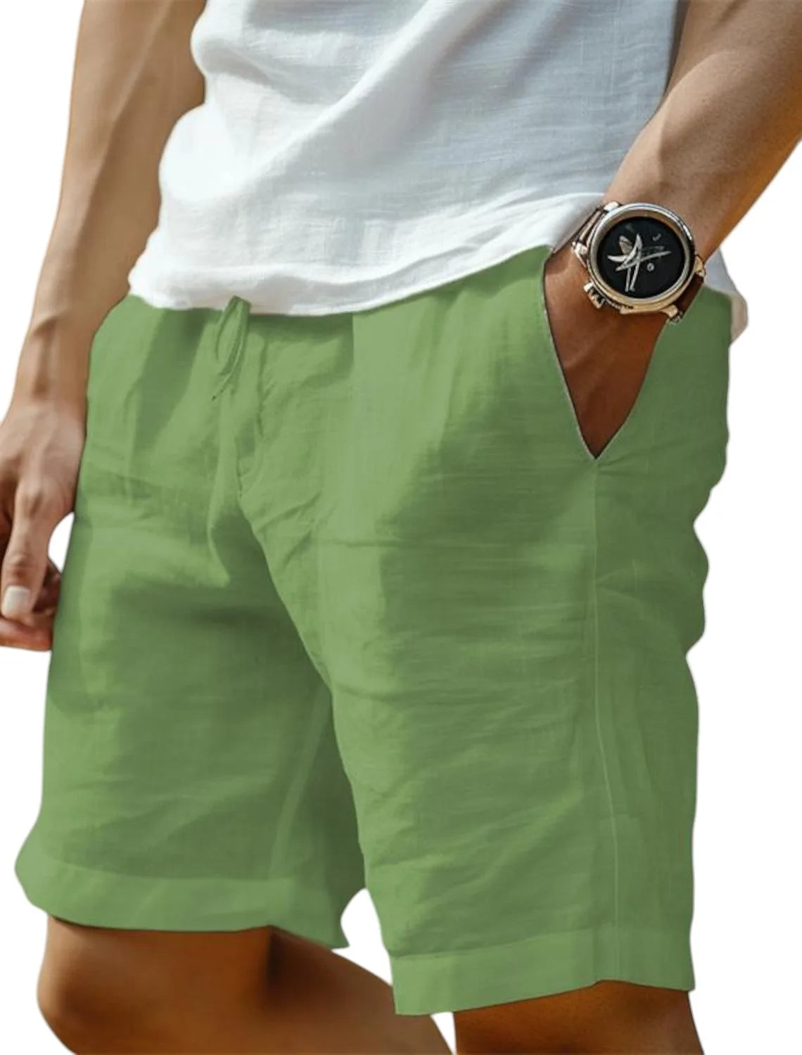 Close-up of a man's hip and thigh wearing sage green linen-blend shorts with a drawstring waist and side pocket