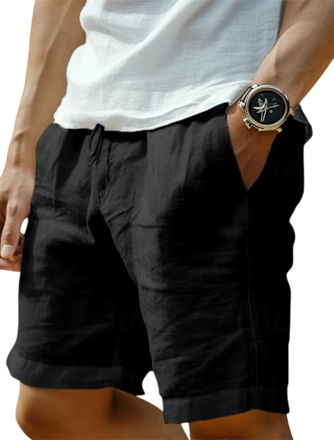 Black linen-blend shorts worn with a white top, showing centre seam and relaxed fit through the leg