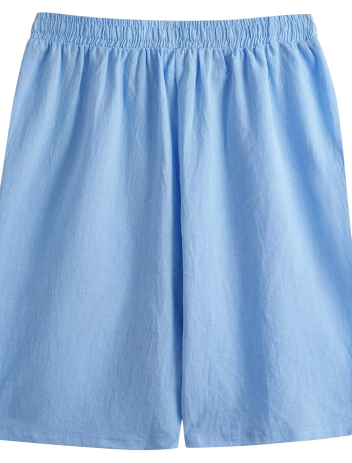 Flat lay of light blue shorts showing elastic waistband and soft lightweight fabric texture