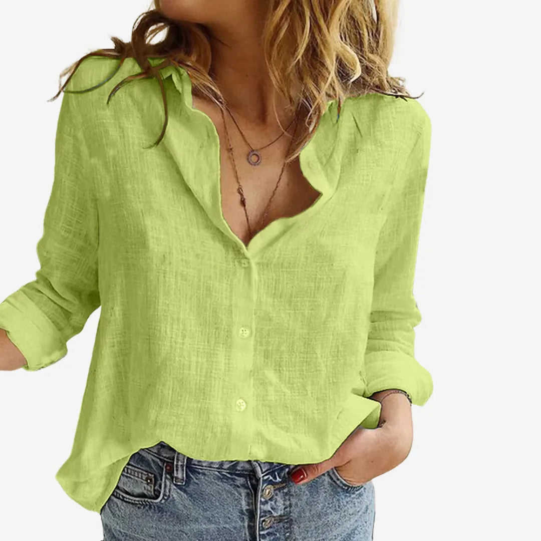 Front view of a lime green linen blouse with stand collar and relaxed fit