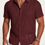 Close-up of a maroon guayabera shirt highlighting the woven lace trim and mother-of-pearl style buttons