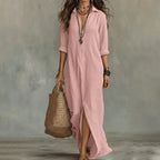 Dusty pink long-sleeve collared maxi dress styled with a woven tote and layered jewellery