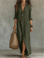 Army green long shirt dress with rolled sleeves and button front, shown in a relaxed ankle-length fit