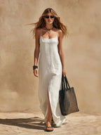 Full-length view of the linen maxi dress silhouette showing the scoop neck, thin straps and floor-length hem