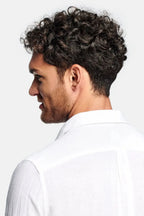 Close-up side profile showing the spread collar and lightweight linen texture of the white shirt