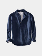 Navy blue collarless linen shirt, flat lay view showing front button placket and relaxed cut