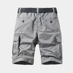 Grey cargo shorts laid flat, back view, showing twin back pockets and elasticated waistband