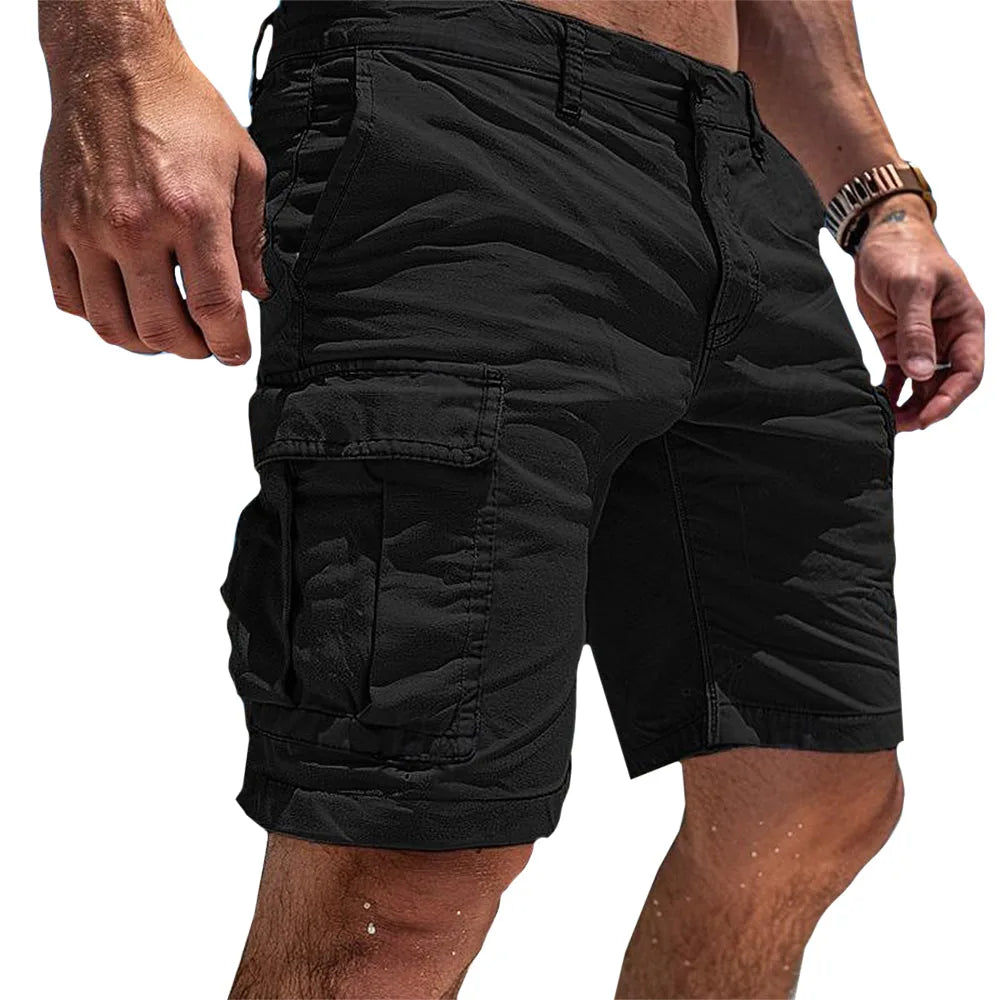 Black cotton cargo shorts photographed from the side, showing the structured waistband and large side pocket