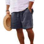 Detail view of the side seam and pocket opening on a pair of lightweight drawstring shorts