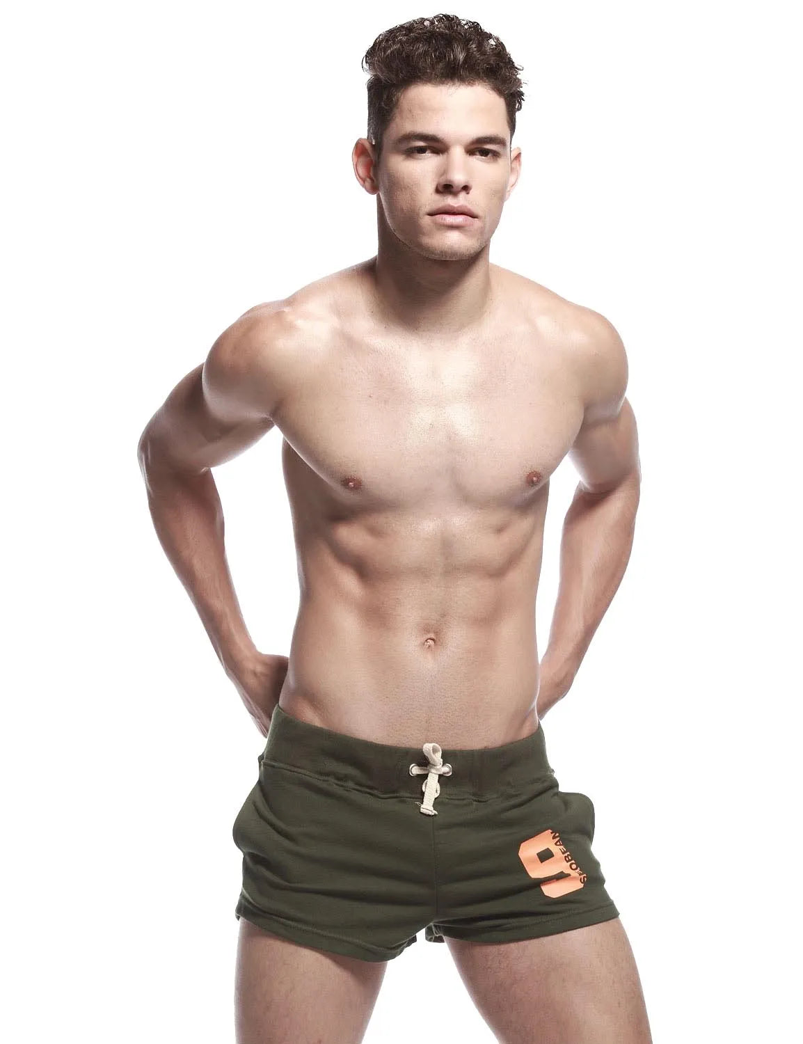 Back view of army green sport shorts showing fitted waistband and single zip-trim pocket