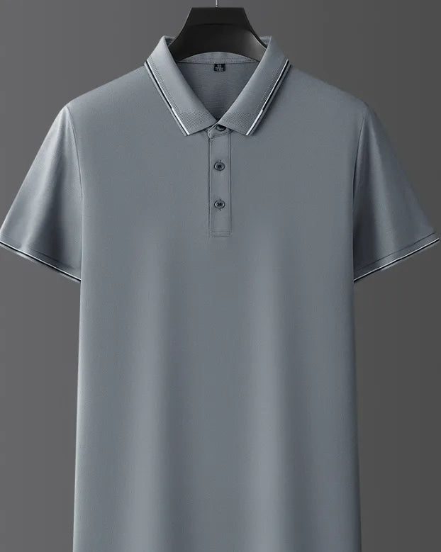 Close-up front view of grey polo shirt on a hanger showing ribbed collar with white trim