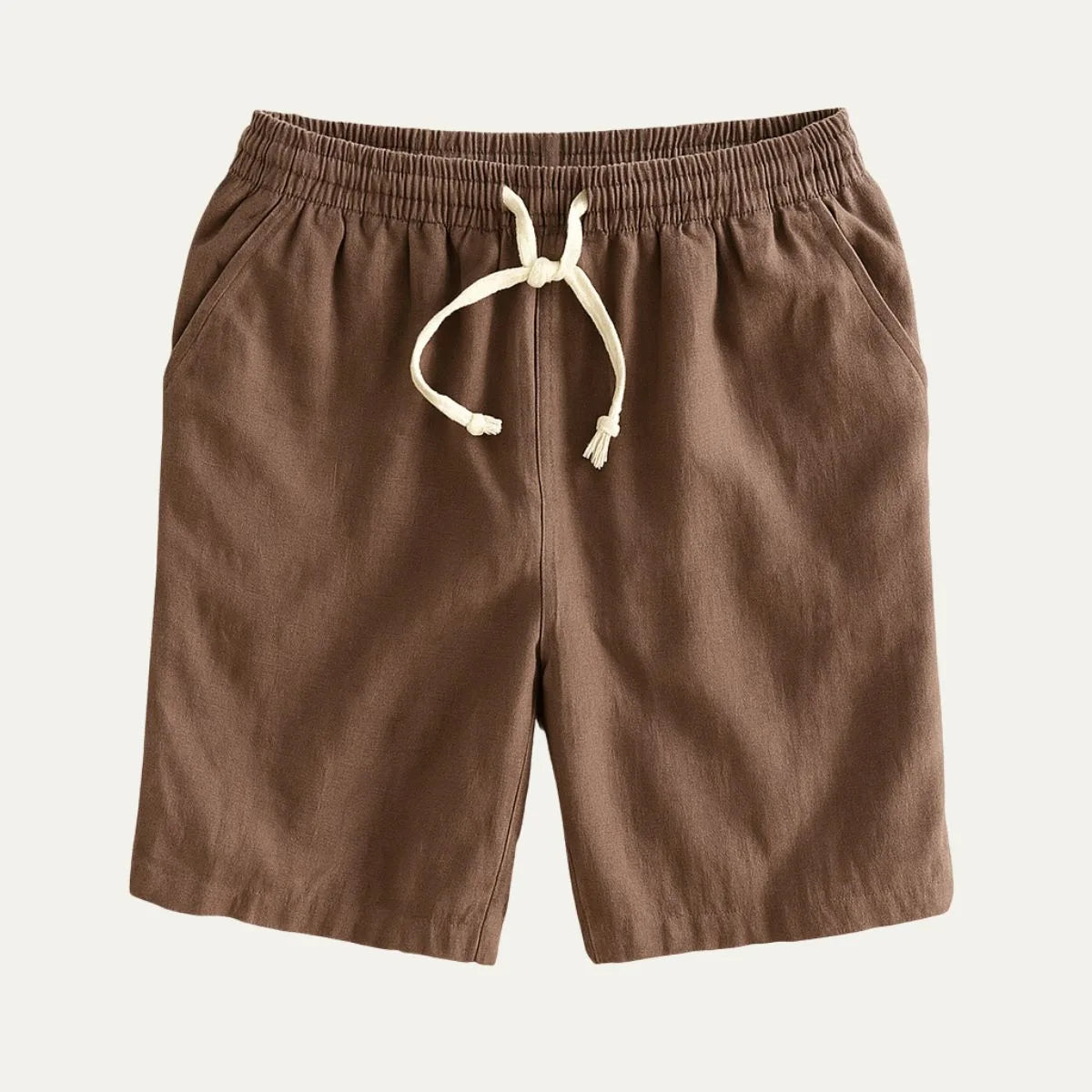 Brown drawstring shorts flat lay showing clean silhouette and side seam pockets