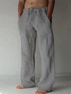Light grey linen drawstring pants with a relaxed wide-leg cut and elastic drawstring waist