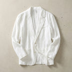 White textured linen blazer laid flat, open front, showing the chest pocket and two-button closure