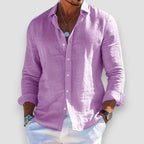 Lilac linen-blend shirt with relaxed collar, button placket and rolled cuffs on a male model