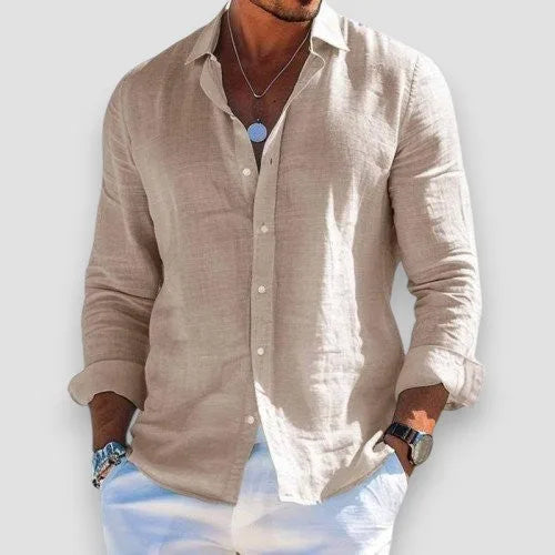 Beige linen-blend shirt with classic collar, buttoned front and rolled sleeves, worn casually open