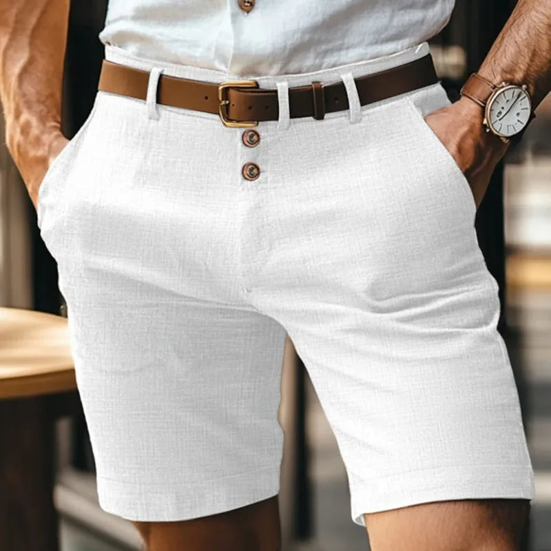 Close-up of textured linen-blend fabric and double wooden-button fly on tailored shorts