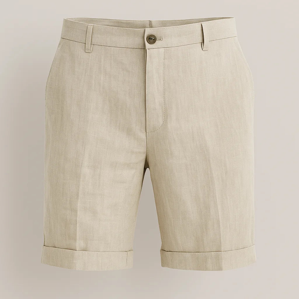 Flat lay of beige linen shorts with button fly, belt loops and side pockets on a neutral background