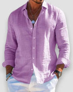 Purple linen shirt with soft drape and relaxed fit, buttons undone at the top for a casual look