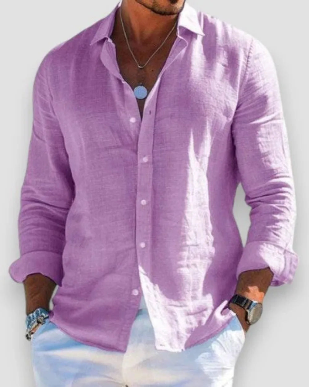 Purple linen shirt with soft drape and relaxed fit, buttons undone at the top for a casual look