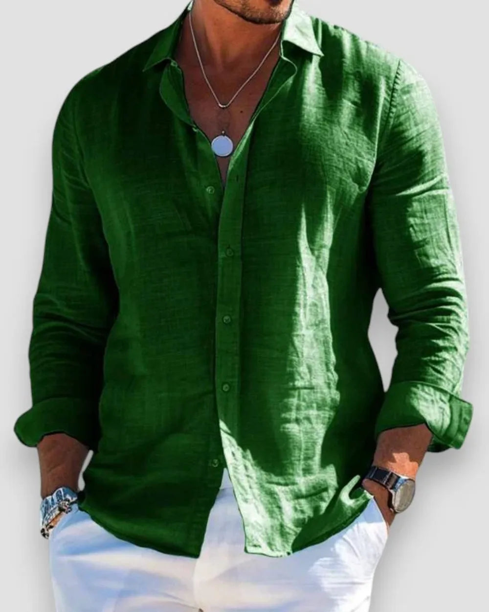 Green linen button-up shirt showing natural woven texture and a relaxed collar