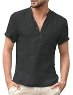 Close-up of a black linen short sleeve shirt with stand collar, button placket and chest pocket on a male model.