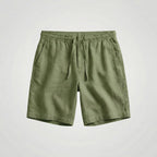 Navy blue linen shorts laid flat against a plain background, front view