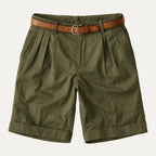 Detail shot highlighting the stitching and pleat construction on the tailored chino shorts