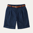Close-up of a coordinating product image showing shorts styling details against a plain backdrop