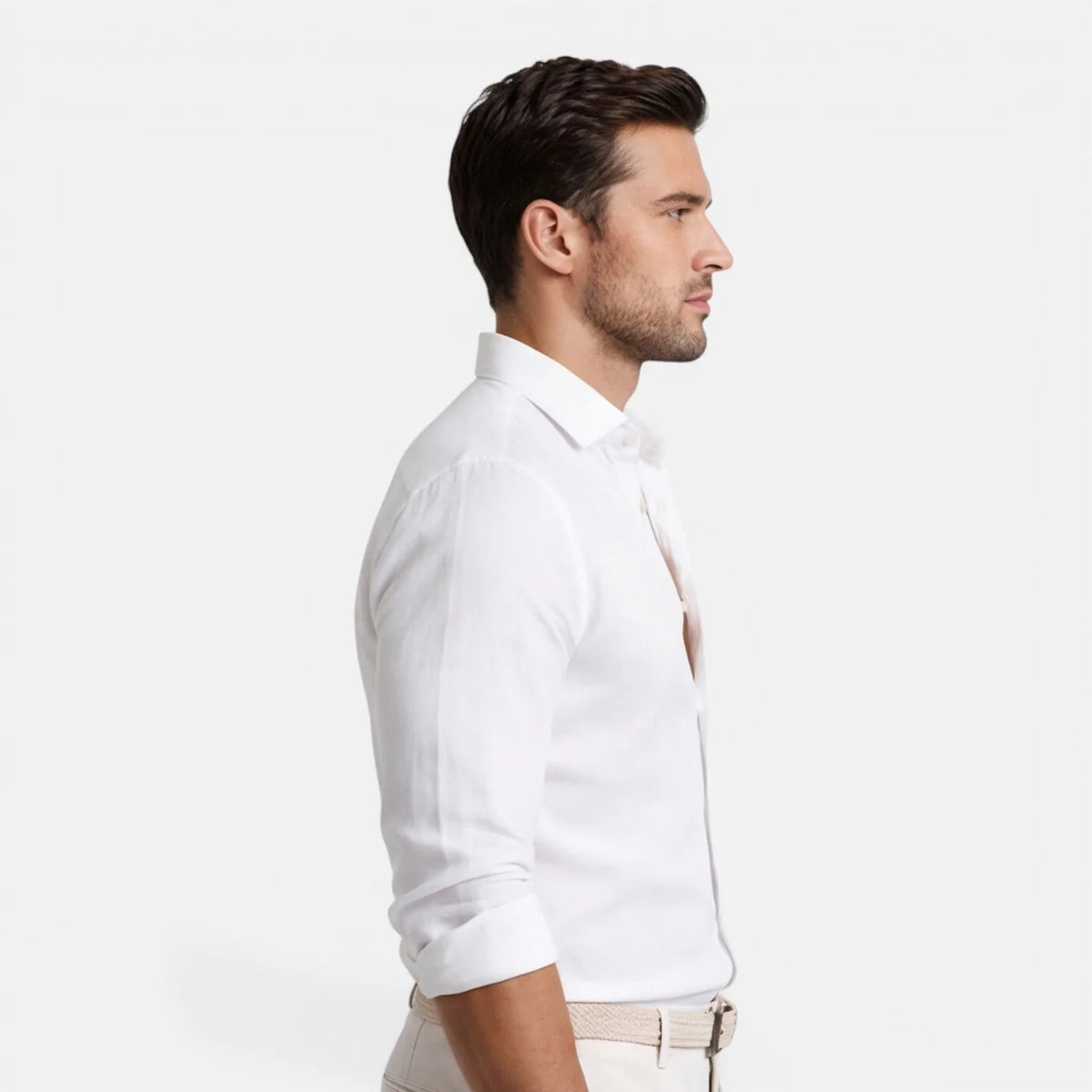 Side profile of white shirt showing slim tailored fit and spread collar detail