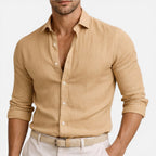 Close-up of beige shirt fabric texture, collar and button placket