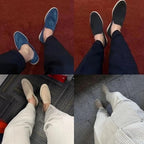 Top-down angle of light blue suede loafers showing apron stitching and moc toe detail