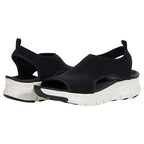 Black knit slip-on sandals shown together, open toe and sling-back heel with white ridged outsole