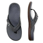 Top and side view of a charcoal grey thong sandal with buckle strap and brown outsole