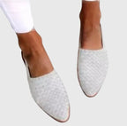 White woven textured slingback flats with pointed closed toe, viewed from above