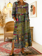 Full-length view of the dress showing the relaxed fit falling to mid-calf over leopard-print flats