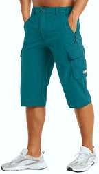 Teal cargo shorts styled with white sneakers, showing the fabric drape and seam detailing