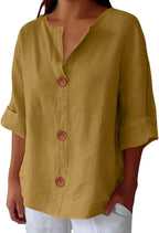 Coral blouse shown from the front with visible fabric texture and button-down styling